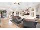 Spacious living room with fireplace, open floor plan, recessed lighting, and modern decor at 633 W Aster Ct, Chandler, AZ 85248