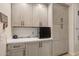 Pantry features shaker cabinets, quartz countertops and white subway tile backsplash at 633 W Aster Ct, Chandler, AZ 85248