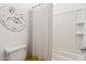 Cozy bathroom featuring a bathtub with shower and stylish accessories at 670 S Beebe St, Gilbert, AZ 85296