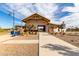 The community center welcomes you with a modern architectural design, open spaces, and inviting walkways amidst desert landscaping at 670 S Beebe St, Gilbert, AZ 85296