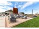 Outdoor fireplace with lounging area near the pool and other community amenities at 670 S Beebe St, Gilbert, AZ 85296