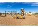 Community playground with a variety of play equipment, including swings, slides and climbing areas at 670 S Beebe St, Gilbert, AZ 85296