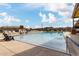 Enjoy a relaxing swim in the expansive community pool, surrounded by comfortable lounge chairs and inviting clear water at 670 S Beebe St, Gilbert, AZ 85296
