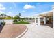 Spacious backyard with a pool, lush landscaping, and a covered patio at 6701 E San Miguel Ave, Paradise Valley, AZ 85253