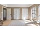 Bedroom boasting a light-filled window, neutral color palette, and modern interior doors at 6701 E San Miguel Ave, Paradise Valley, AZ 85253