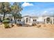 Beautiful property featuring a rounded entry and drought-resistant landscaping at 6701 E San Miguel Ave, Paradise Valley, AZ 85253