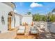 Charming outdoor patio features ample seating, tile flooring, and a tranquil outdoor space at 6701 E San Miguel Ave, Paradise Valley, AZ 85253