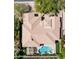 Private backyard includes pool, patio, mature trees, and desert landscaping at 7130 E Saddleback St # 58, Mesa, AZ 85207