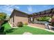 Beautiful backyard features a covered patio, outdoor kitchen, pool and lush landscaping at 7130 E Saddleback St # 58, Mesa, AZ 85207