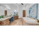Bathroom featuring wooden cabinets, granite countertops, a soaking tub, and a tiled floor at 7130 E Saddleback St # 58, Mesa, AZ 85207