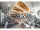 The gym showcases state-of-the-art equipment under high, exposed ceilings, and offers a premium fitness experience for residents at 7130 E Saddleback St # 58, Mesa, AZ 85207