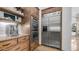 Modern kitchen featuring stainless steel appliances, custom wood cabinetry, and granite countertops at 7130 E Saddleback St # 58, Mesa, AZ 85207