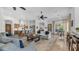 Open-concept living room showcasing the kitchen, dining, and living areas with stylish decor at 7130 E Saddleback St # 58, Mesa, AZ 85207
