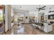 Bright living room with marble floors, elegant furnishings, and natural light from large windows at 7130 E Saddleback St # 58, Mesa, AZ 85207