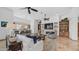 Spacious living room with a fireplace, ceiling fans, and open layout perfect for entertaining at 7130 E Saddleback St # 58, Mesa, AZ 85207