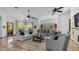 Bright living area with an open layout, ceiling fans, and views of the beautifully landscaped yard at 7130 E Saddleback St # 58, Mesa, AZ 85207