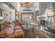 Spacious lobby with vaulted ceilings, stone fireplace, comfortable seating and lots of natural light at 7130 E Saddleback St # 58, Mesa, AZ 85207