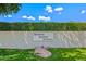 A sign for Seventh Avenue Estates with manicured hedges and rock landscaping at 715 W Townley Ave, Phoenix, AZ 85021