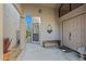 Inviting front entrance with bench seating and decorative wall art at 715 W Townley Ave, Phoenix, AZ 85021