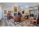 Open living room has a fireplace and recessed lighting at 715 W Townley Ave, Phoenix, AZ 85021