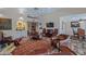 Large living room with comfortable furnishings and a television for entertainment at 715 W Townley Ave, Phoenix, AZ 85021