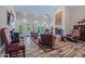 Spacious living room boasts a fireplace, high ceilings, and plenty of natural light at 715 W Townley Ave, Phoenix, AZ 85021