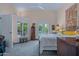 Bright bedroom with a king bed, tapestry wall hanging, and shutters at 715 W Townley Ave, Phoenix, AZ 85021