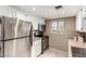 Efficient kitchen with stainless steel appliances and white cabinets at 7436 E Chaparral Rd # 124B, Scottsdale, AZ 85250