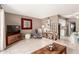 Inviting living room with neutral walls, tile floors, and decorative touches create a cozy atmosphere at 7436 E Chaparral Rd # 124B, Scottsdale, AZ 85250