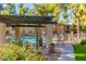 Community pool with shade structure and ample seating offers a relaxing oasis at 7436 E Chaparral Rd # 124B, Scottsdale, AZ 85250