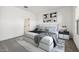 Modern bedroom features stylish decor, a comfortable bed, and neutral colors at 7718 W Minton St, Laveen, AZ 85339
