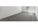 Sparse bedroom with gray carpet and a view from the window at 7718 W Minton St, Laveen, AZ 85339