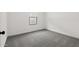 Neutral bedroom with one window and gray carpet at 7718 W Minton St, Laveen, AZ 85339