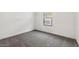 Standard bedroom with gray carpet and one window at 7718 W Minton St, Laveen, AZ 85339