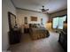 Spacious main bedroom featuring plush carpet and decorative accents at 8180 E Shea Blvd # 1028, Scottsdale, AZ 85260