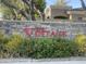 Welcome to The Vintage, community sign in front of stone wall and landscaping at 8180 E Shea Blvd # 1028, Scottsdale, AZ 85260