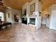 Open-concept living room showcasing tile floors and access to multiple rooms at 8180 E Shea Blvd # 1028, Scottsdale, AZ 85260