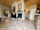 Expansive living room with tile flooring and a fireplace feature at 8180 E Shea Blvd # 1028, Scottsdale, AZ 85260