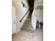 Carpeted staircase featuring tile flooring and detailed decor at 8180 E Shea Blvd # 1028, Scottsdale, AZ 85260