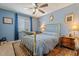 Cozy bedroom showcases a brass bed frame, classic furnishings, and a ceiling fan at 8545 E Heatherbrae Dr, Scottsdale, AZ 85251