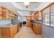 Spacious kitchen features granite countertops, stainless steel appliances, and ample natural light at 8545 E Heatherbrae Dr, Scottsdale, AZ 85251