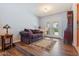 Cozy sitting room filled with furniture and natural light from backyard at 8545 E Heatherbrae Dr, Scottsdale, AZ 85251