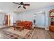 Inviting living room featuring laminate floors and neutral wall tones at 8545 E Heatherbrae Dr, Scottsdale, AZ 85251