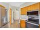 Well-equipped kitchen with modern appliances, ample cabinet space, and a view into the next room at 9127 E Siesta Ln, Scottsdale, AZ 85255
