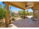 Inviting covered patio overlooking serene desert landscape at 9127 E Siesta Ln, Scottsdale, AZ 85255