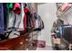 Walk-in closet equipped with lots of storage and shelving at 10101 N Arabian Trl # 2018, Scottsdale, AZ 85258