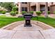 Well-kept community grill area with lush green surroundings at 10101 N Arabian Trl # 2018, Scottsdale, AZ 85258