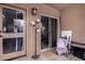 Covered outdoor patio with stylish decor and comfortable seating at 10101 N Arabian Trl # 2018, Scottsdale, AZ 85258