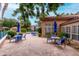 Pool area with tables and chairs in a well-maintained community at 10101 N Arabian Trl # 2018, Scottsdale, AZ 85258
