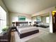 Serene primary bedroom featuring neutral tones, ample closet space, and calming decor at 11022 S Iroquois Dr, Phoenix, AZ 85044